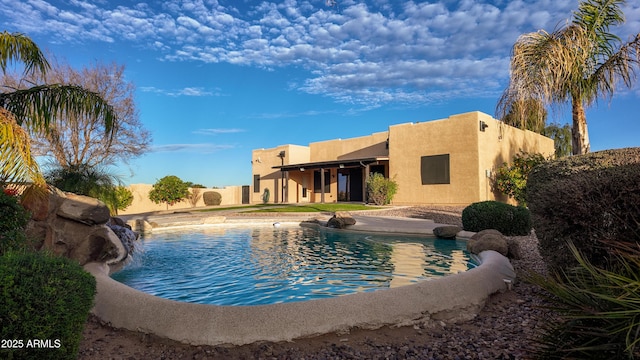 view of pool featuring a fenced backyard and a fenced in pool