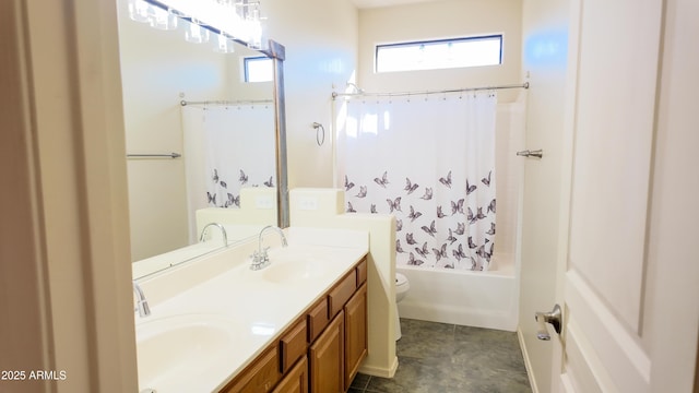 bathroom with double vanity, a sink, toilet, and shower / tub combo with curtain