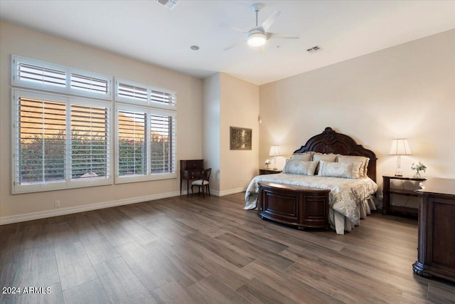 bedroom with hardwood / wood-style flooring and ceiling fan