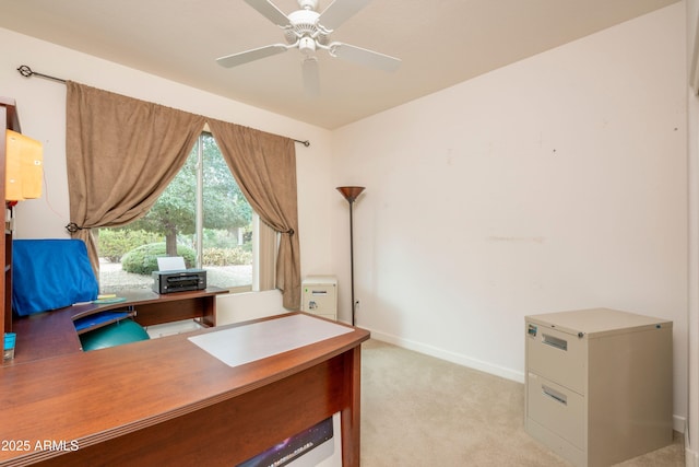 carpeted home office with ceiling fan