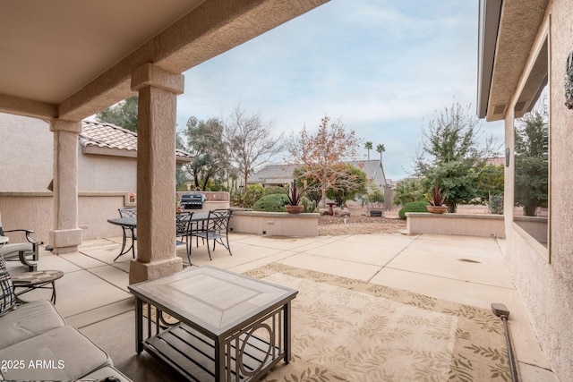 view of patio / terrace featuring a jacuzzi