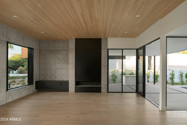 5939 E Orange Blossom Ln, Phoenix, AZ 85018 - unfurnished room featuring wood finished floors and wood ceiling