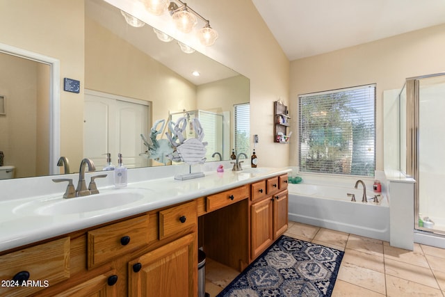 full bathroom featuring vanity, plus walk in shower, vaulted ceiling, tile patterned flooring, and toilet