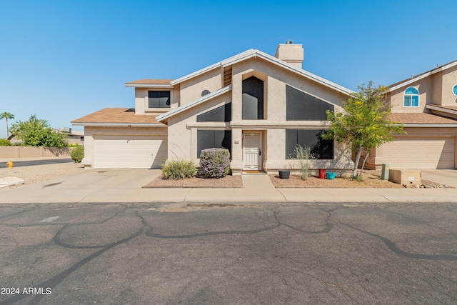 view of front of home with a garage