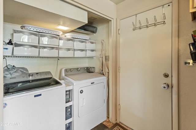 laundry room featuring independent washer and dryer