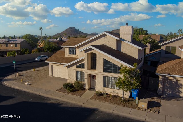 view of front of property with a mountain view