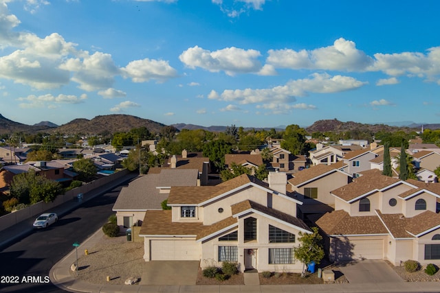 drone / aerial view featuring a mountain view