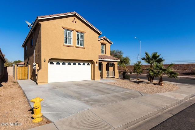 view of front of property featuring a garage