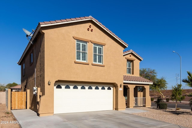 view of front of property with a garage