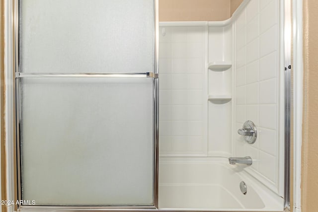 bathroom featuring enclosed tub / shower combo