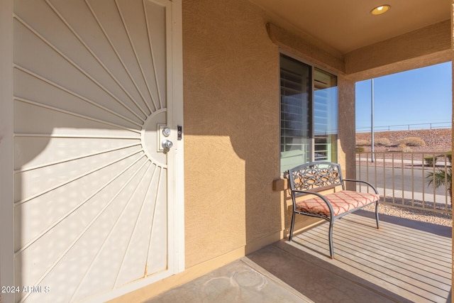 entrance to property featuring a balcony