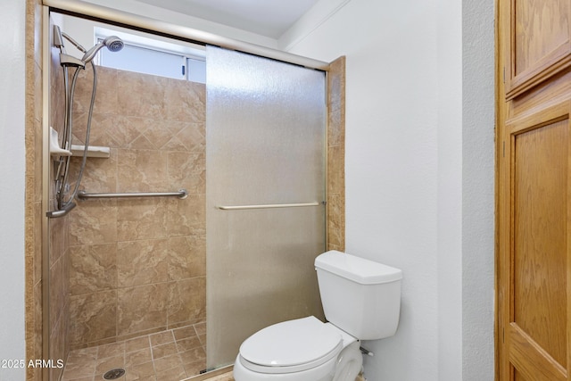 full bathroom with toilet and a shower stall