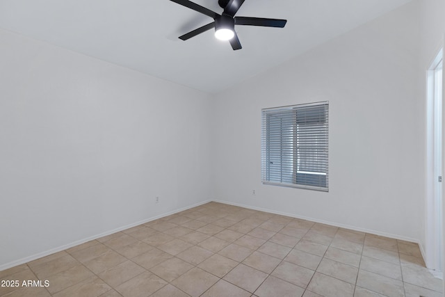 unfurnished room featuring vaulted ceiling, baseboards, and ceiling fan