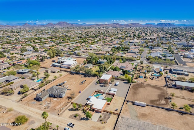 drone / aerial view with a residential view and a mountain view