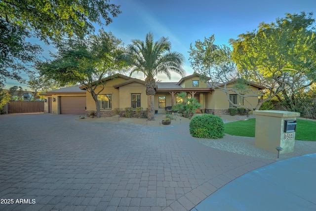 view of front of home with a garage