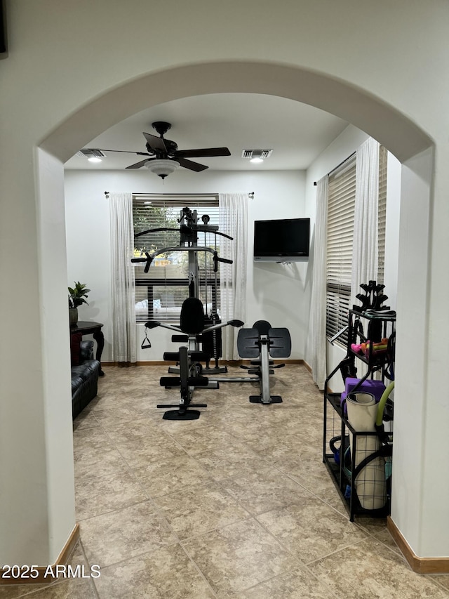 exercise room featuring ceiling fan