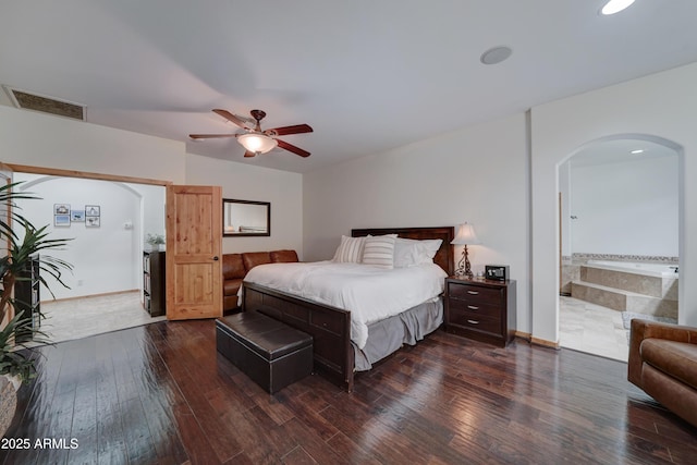 bedroom featuring dark hardwood / wood-style floors and ceiling fan