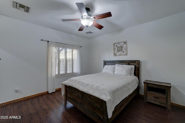 bedroom featuring ceiling fan and dark hardwood / wood-style flooring