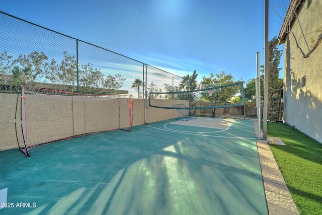 view of basketball court with volleyball court