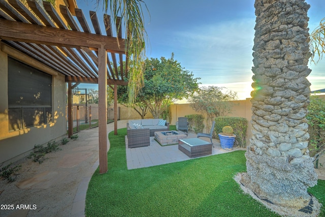 yard at dusk with a pergola, an outdoor living space with a fire pit, and a patio area