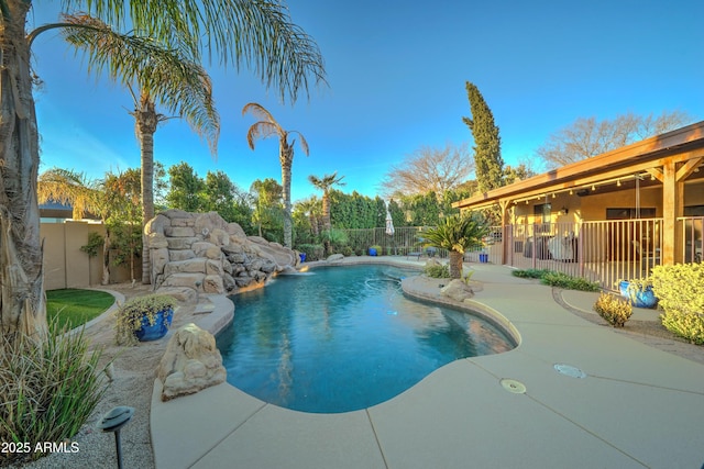 view of pool featuring pool water feature