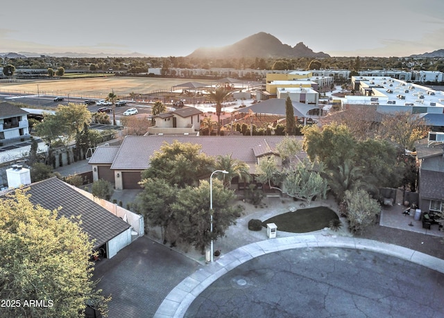 aerial view at dusk with a mountain view