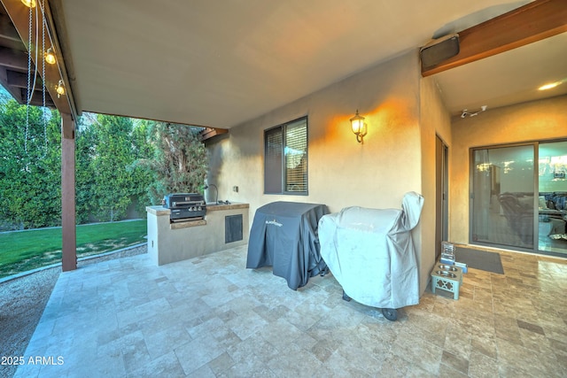 view of patio with a grill and exterior kitchen