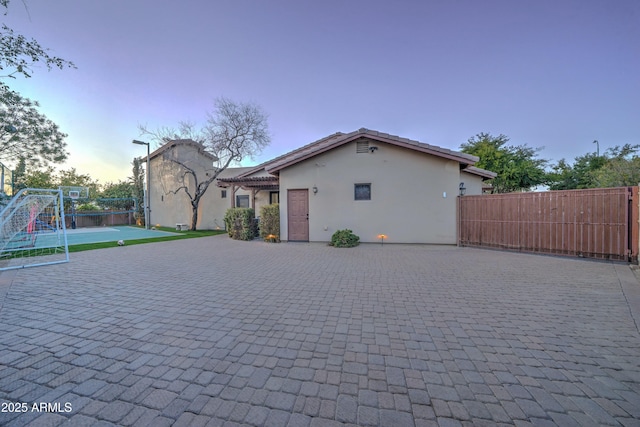 view of front of property with a pergola