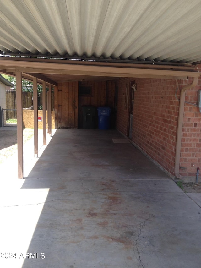 garage featuring a carport