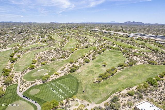 birds eye view of property featuring view of golf course, a residential view, and a mountain view