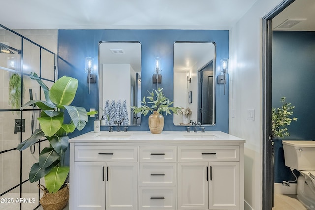 full bath with visible vents, a sink, and double vanity