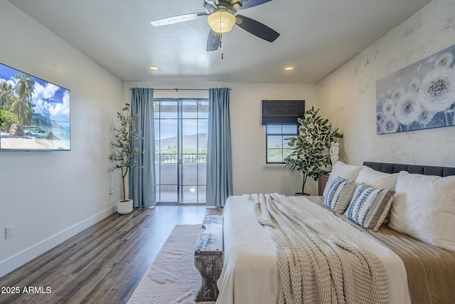 bedroom with baseboards, recessed lighting, wood finished floors, and access to exterior