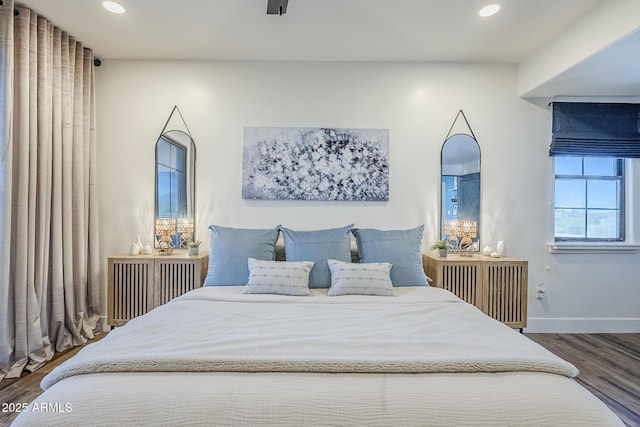 bedroom featuring recessed lighting, baseboards, and wood finished floors