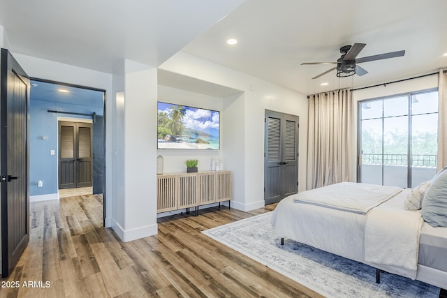 bedroom with access to outside, recessed lighting, baseboards, a ceiling fan, and wood finished floors
