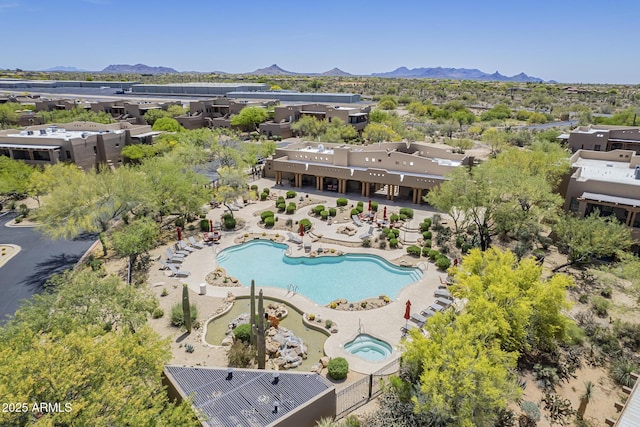 bird's eye view with a mountain view