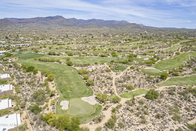 drone / aerial view with a residential view, view of golf course, and a mountain view