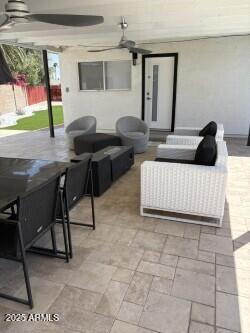 3758 E Sunnyside Dr, Phoenix, AZ 85028 - view of patio / terrace featuring an outdoor living space, a ceiling fan, and fence