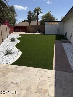 3758 E Sunnyside Dr, Phoenix, AZ 85028 - view of yard with a fenced backyard and a patio area