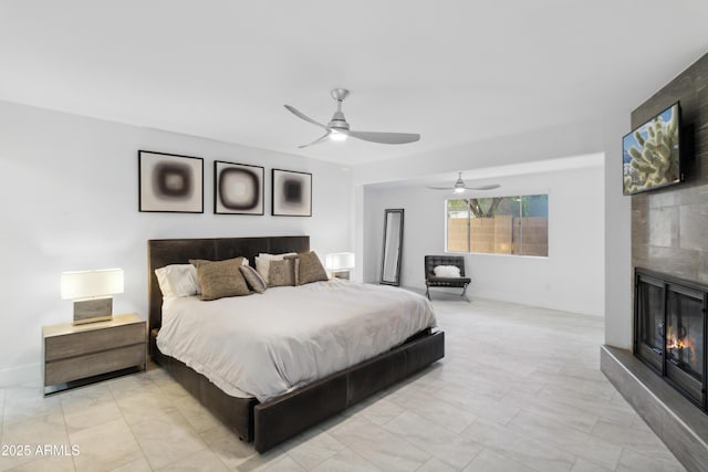 3758 E Sunnyside Dr, Phoenix, AZ 85028 - bedroom with ceiling fan and a large fireplace