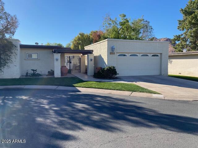 single story home with a garage