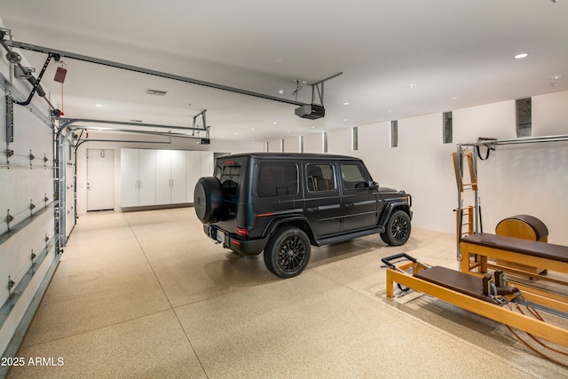 garage featuring a garage door opener