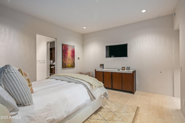 bedroom with a walk in closet