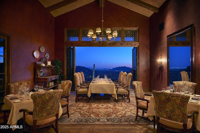 dining room with a mountain view, high vaulted ceiling, a chandelier, parquet floors, and beamed ceiling