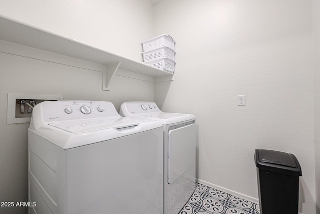 laundry area with separate washer and dryer