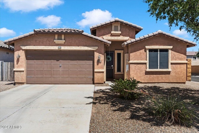 view of front of home with a garage