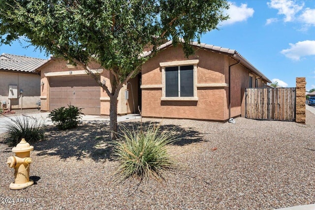 view of front of home with a garage