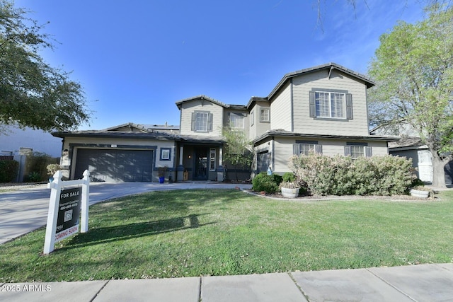 view of front facade with a garage, concrete driveway, a front lawn, and solar panels