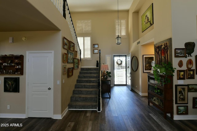 3062 E Cullumber St, Gilbert, AZ 85234 - foyer featuring a towering ceiling, baseboards, stairway, and dark wood finished floors