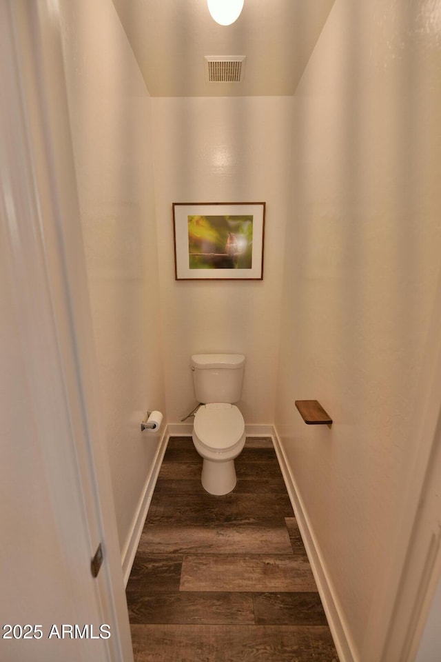 3062 E Cullumber St, Gilbert, AZ 85234 - bathroom with toilet, wood finished floors, visible vents, and baseboards