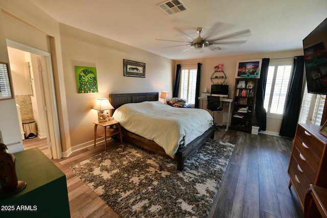 3062 E Cullumber St, Gilbert, AZ 85234 - bedroom featuring multiple windows, dark wood finished floors, visible vents, and baseboards